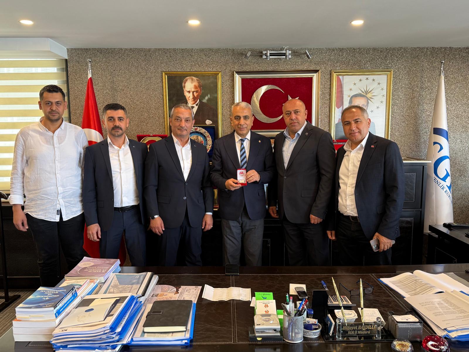 Sosyal Güvenlik Haftası Nedeniyle SGK İzmir İl Müdürü Hidayet Baydilli’ye Ziyaret